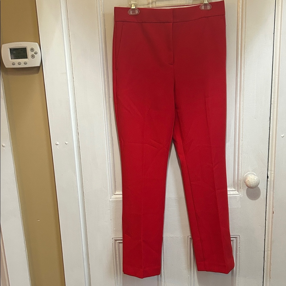Ann Taylor Vibrant Red Boot Cut Trousers. Pant leg with side slit